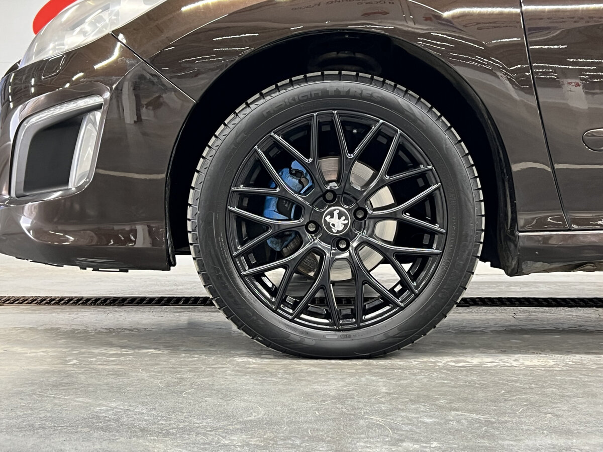 Peugeot 308 I Рестайлинг, 2012 Фото №17